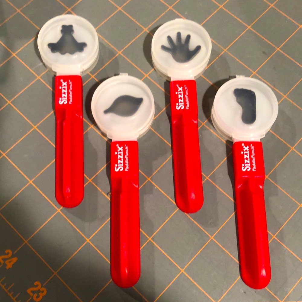 4. Sizzix paddle Punch Positionable Hand Punch die